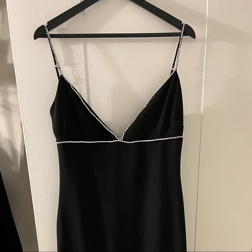 Black elegant dress from House of CB. Only worn once for New Years Eve. Large.